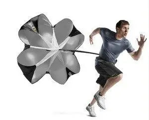 A man running with the drag parachute 